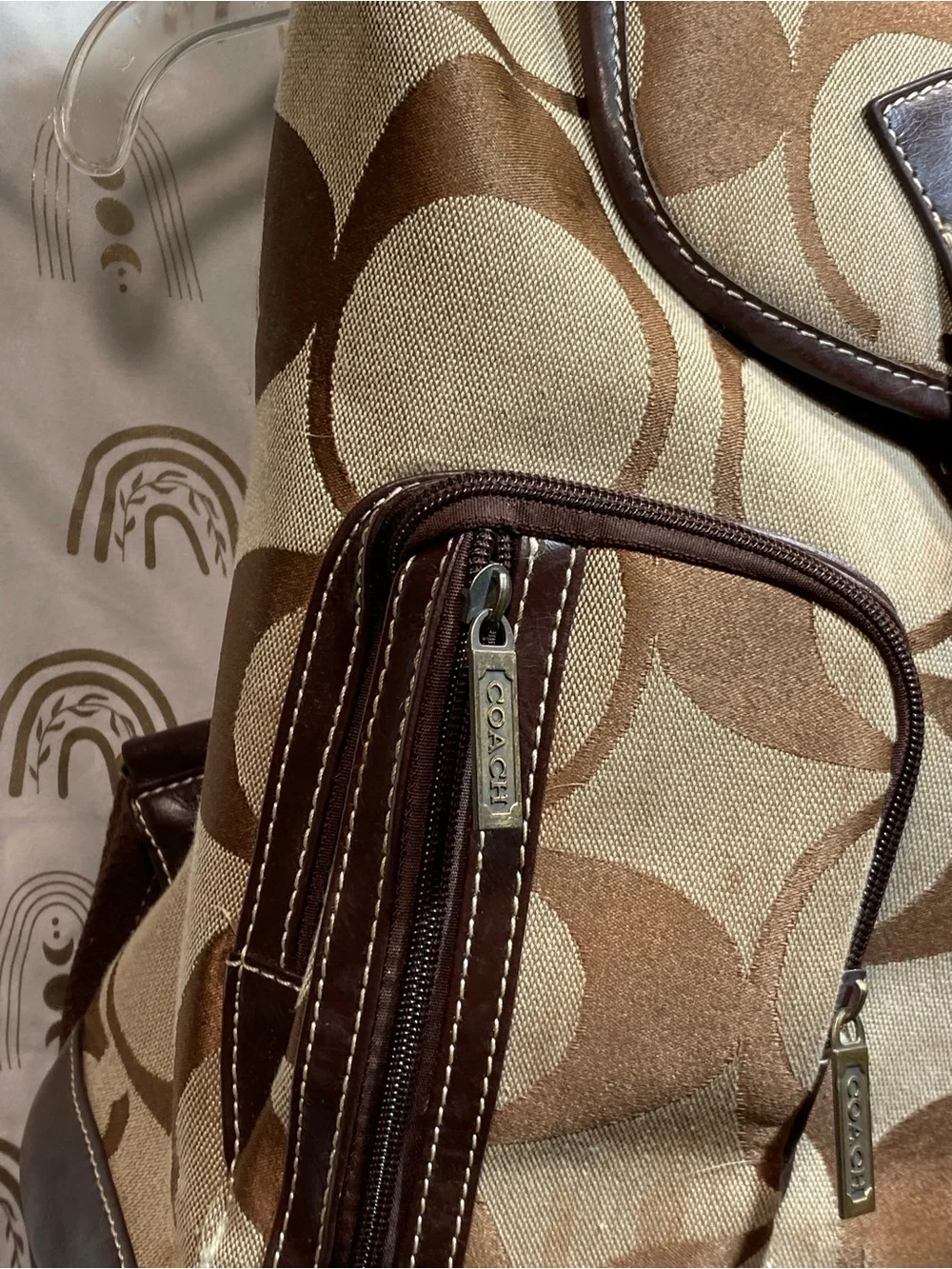 C Brown and Tan Signature Canvas Backpack